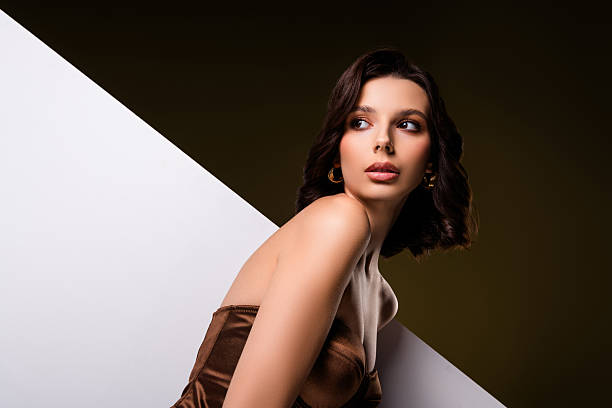 Elegant woman wears brown corset, achieving a stunning black corset-inspired look.